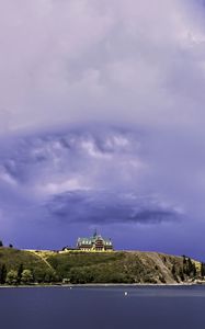 Preview wallpaper island, building, hill, sea, landscape