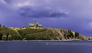 Preview wallpaper island, building, hill, sea, landscape