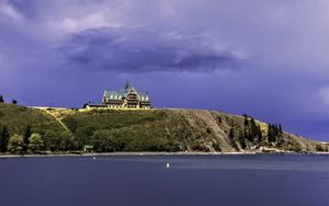 Preview wallpaper island, building, hill, sea, landscape