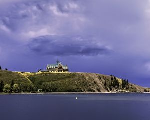 Preview wallpaper island, building, hill, sea, landscape