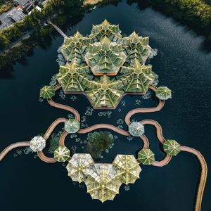 Preview wallpaper island, buildings, aerial view, lake, water