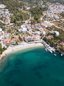 Preview wallpaper island, buildings, beach, sea, aerial view