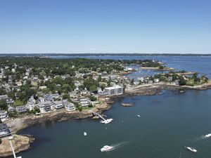 Preview wallpaper island, buildings, coast, pier, boats, sea