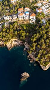 Preview wallpaper island, buildings, sea, aerial view