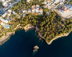 Preview wallpaper island, buildings, sea, aerial view