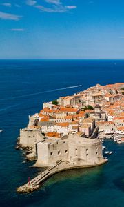 Preview wallpaper island, city, old, roofs, sea, aerial view