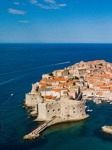 Preview wallpaper island, city, old, roofs, sea, aerial view