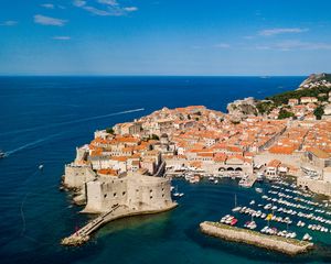 Preview wallpaper island, city, old, roofs, sea, aerial view