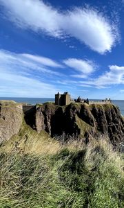 Preview wallpaper island, cliff, building, fortress, grass, sea