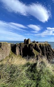 Preview wallpaper island, cliff, building, fortress, grass, sea