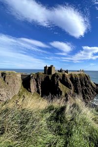 Preview wallpaper island, cliff, building, fortress, grass, sea