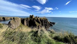 Preview wallpaper island, cliff, building, fortress, grass, sea