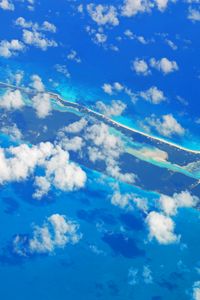 Preview wallpaper island, clouds, sea, aerial view, blue