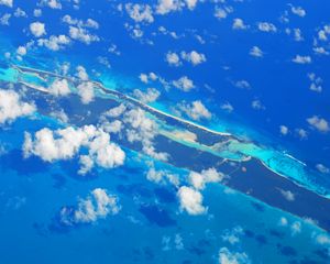 Preview wallpaper island, clouds, sea, aerial view, blue