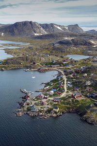 Preview wallpaper island, coast, buildings, sea, pier