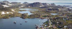 Preview wallpaper island, coast, buildings, sea, pier