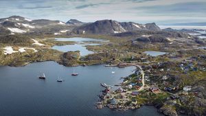 Preview wallpaper island, coast, buildings, sea, pier