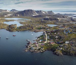 Preview wallpaper island, coast, buildings, sea, pier