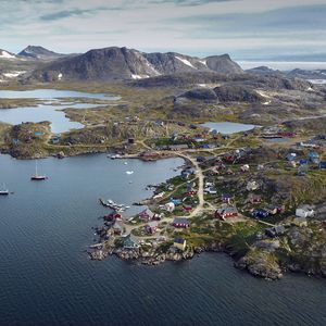 Preview wallpaper island, coast, buildings, sea, pier