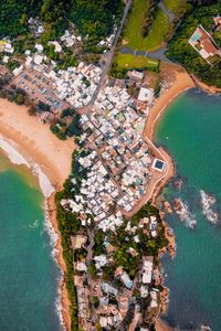 Preview wallpaper island, coast, ocean, buildings, aerial view