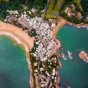 Preview wallpaper island, coast, ocean, buildings, aerial view