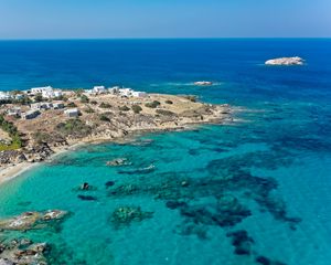 Preview wallpaper island, coast, sea, buildings, horizon