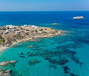 Preview wallpaper island, coast, sea, buildings, horizon