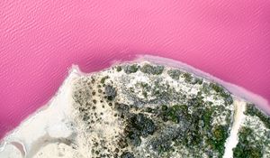 Preview wallpaper island, coast, sea, pink, aerial view