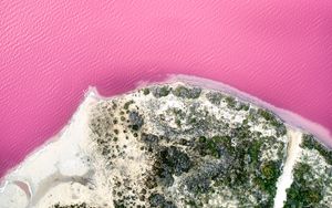 Preview wallpaper island, coast, sea, pink, aerial view