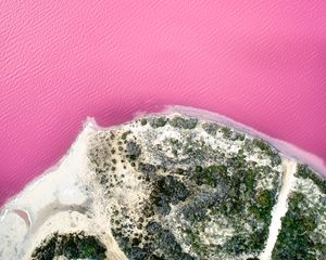 Preview wallpaper island, coast, sea, pink, aerial view