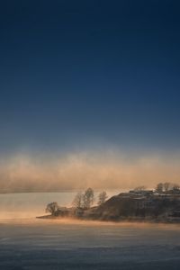 Preview wallpaper island, fog, clouds, sea, landscape