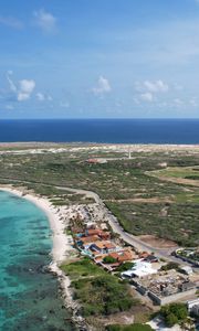 Preview wallpaper island, houses, buildings, coast, sea