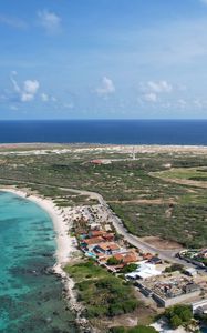 Preview wallpaper island, houses, buildings, coast, sea