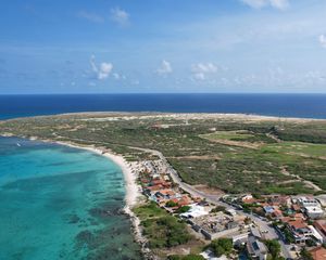 Preview wallpaper island, houses, buildings, coast, sea