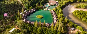 Preview wallpaper island, houses, pond, trees, aerial view