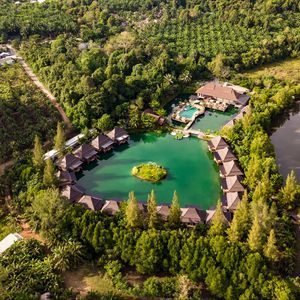 Preview wallpaper island, houses, pond, trees, aerial view