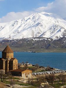 Preview wallpaper island, lake, mountains, water, structure, coast