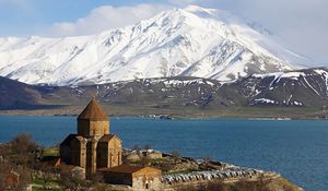 Preview wallpaper island, lake, mountains, water, structure, coast