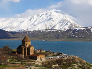 Preview wallpaper island, lake, mountains, water, structure, coast