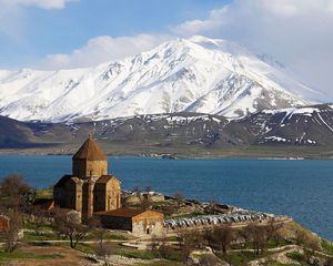 Preview wallpaper island, lake, mountains, water, structure, coast