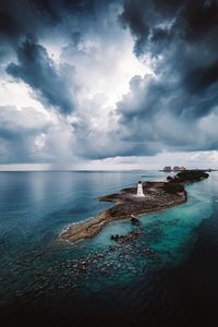 Preview wallpaper island, lighthouse, sea, clouds, landscape