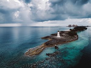 Preview wallpaper island, lighthouse, sea, clouds, landscape