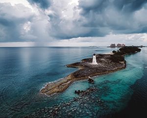 Preview wallpaper island, lighthouse, sea, clouds, landscape