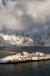 Preview wallpaper island, mountains, snow, sea, houses