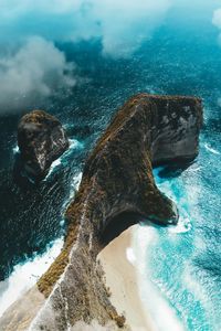 Preview wallpaper island, rock, aerial view, sea, clouds