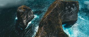 Preview wallpaper island, rock, aerial view, sea, clouds