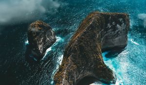 Preview wallpaper island, rock, aerial view, sea, clouds