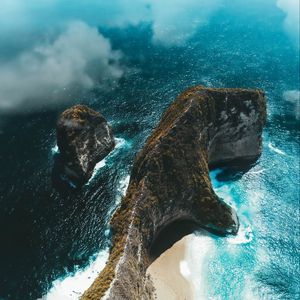 Preview wallpaper island, rock, aerial view, sea, clouds