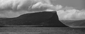 Preview wallpaper island, rock, clouds, landscape, black and white