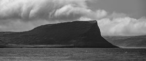 Preview wallpaper island, rock, clouds, landscape, black and white